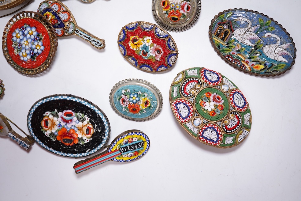 Thirty-one costume micro-mosaic brooches, to include seventeen guitar and banjo shaped brooches, five large oval/ circular brooches including scenic swan brooch, eight, smaller brooches and a pendant. Condition - fair/go